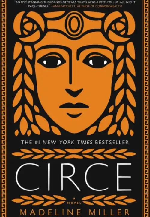 Book Cover of Circe. A geometric womans orange face is in front of a black background. Her hair looks like wheat falling down from two flowers on her temples.